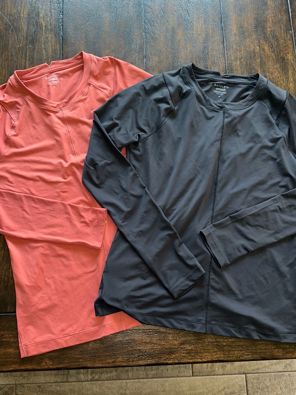 Two Athleta Long Sleeve sunchaser Performance Tops - Coral & Black size Medium